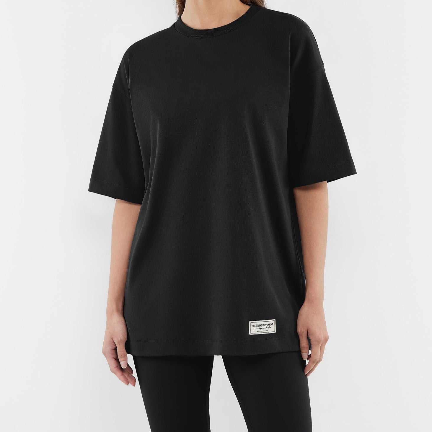 Oversized Vertical Print T-Shirt Pitch Black | Unisex Apparel | THEGIVINGMOVEMENT | S14CJPRIV14PBWM Oversized Vertical Print T-Shirt Pitch Black | Unisex Apparel | THEGIVINGMOVEMENT | S14CJPRIV14PBWM