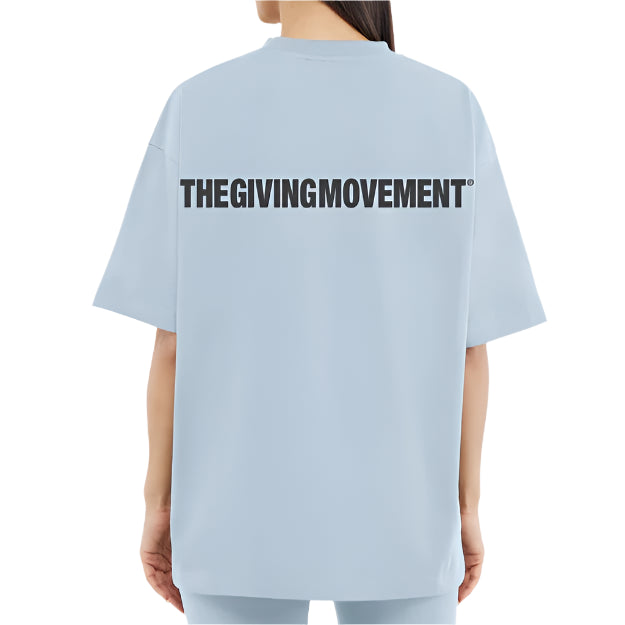 Organic Cotton Jersey Oversized T-Shirt Powder Blue | Unisex Apparel | THEGIVINGMOVEMENT | S14CJV14PWBWM_1 Organic Cotton Jersey Oversized T-Shirt Powder Blue | Unisex Apparel | THEGIVINGMOVEMENT | S14CJV14PWBWM_1